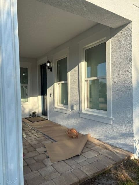 Porch area prepped and protected for exterior painting