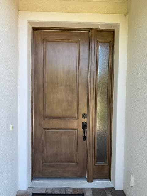 Entry door after staining — fresh custom stain finish